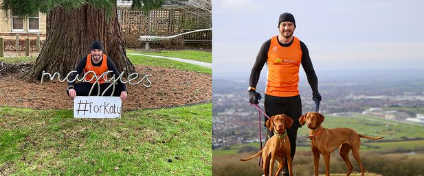 Matthew on top of a hill with his two dogs
